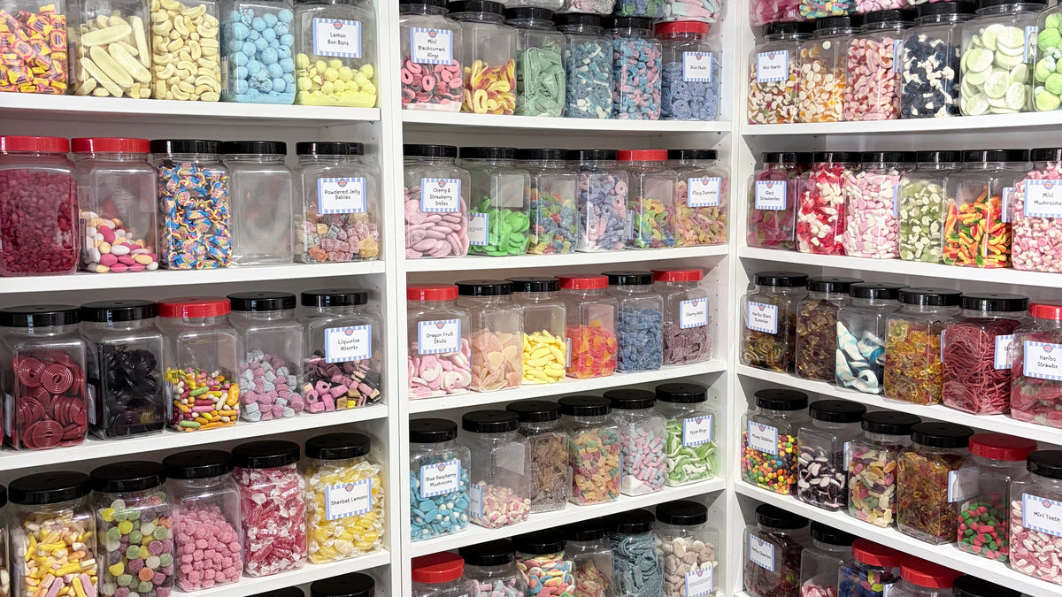 Wall of pick n mix sweet jars at Anderson's Sweet Shop in Shrivenham, Swindon